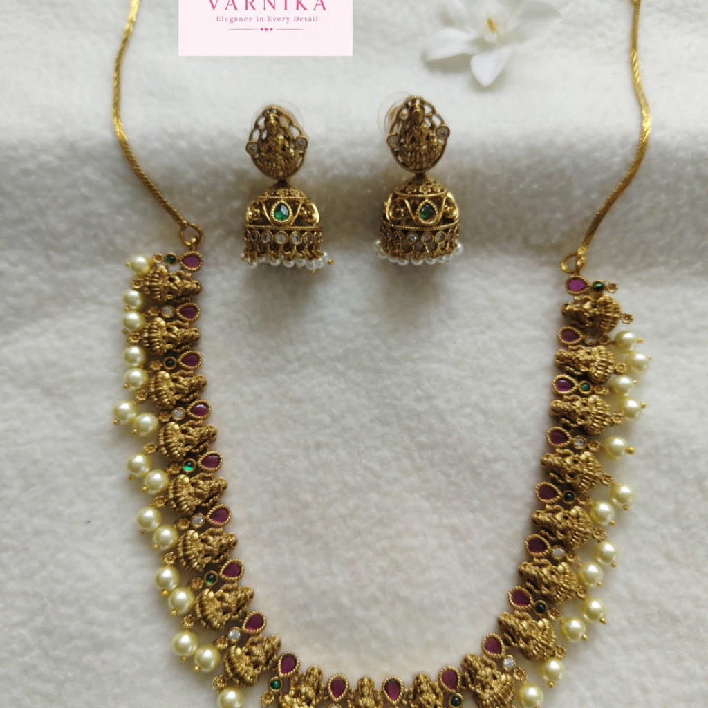 Temple Lakshmi Pearl Necklace Set : Add a touch of divine elegance to your traditional look with the Temple Lakshmi Pearl Necklace Set ✨